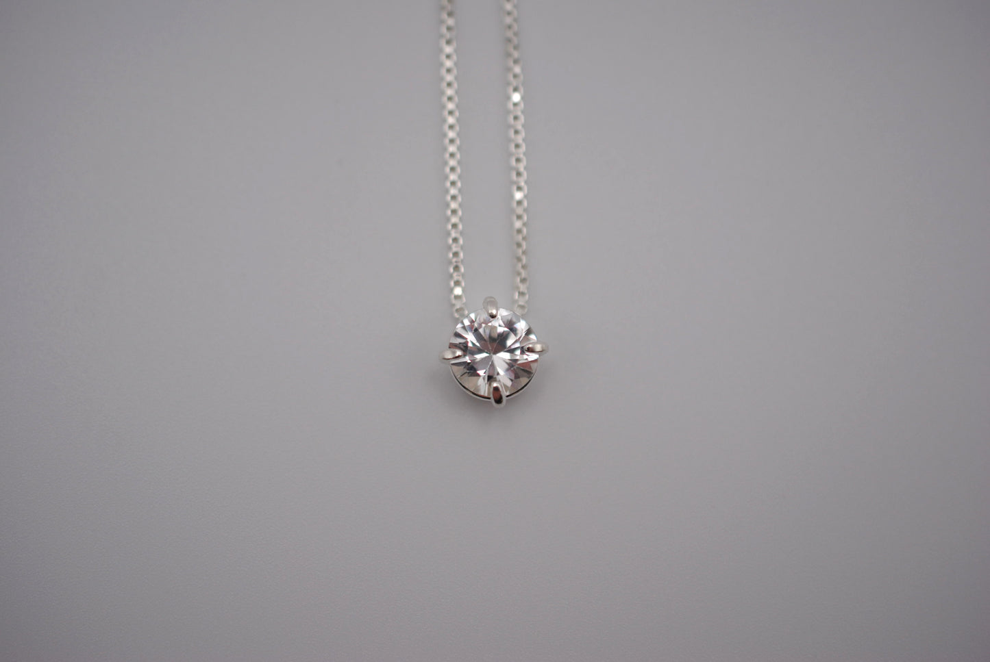 Birthstone Necklace: Round Cubic Zirconia, Silver Prong Setting, Adjustable Chain