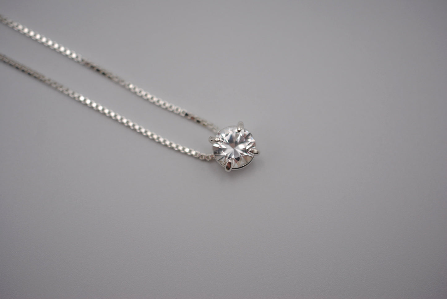 Birthstone Necklace: Round Cubic Zirconia, Silver Prong Setting, Adjustable Chain