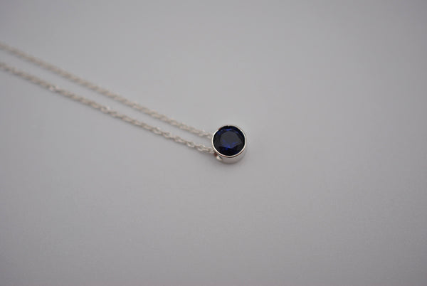 Birthstone Necklace: Round Sapphire, Silver Bezel, on Cable Chain