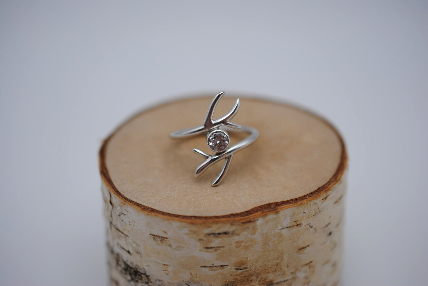 Cubic Zirconia Ring: Round Cut, Branch Band, Bezel, Rhodium Finished