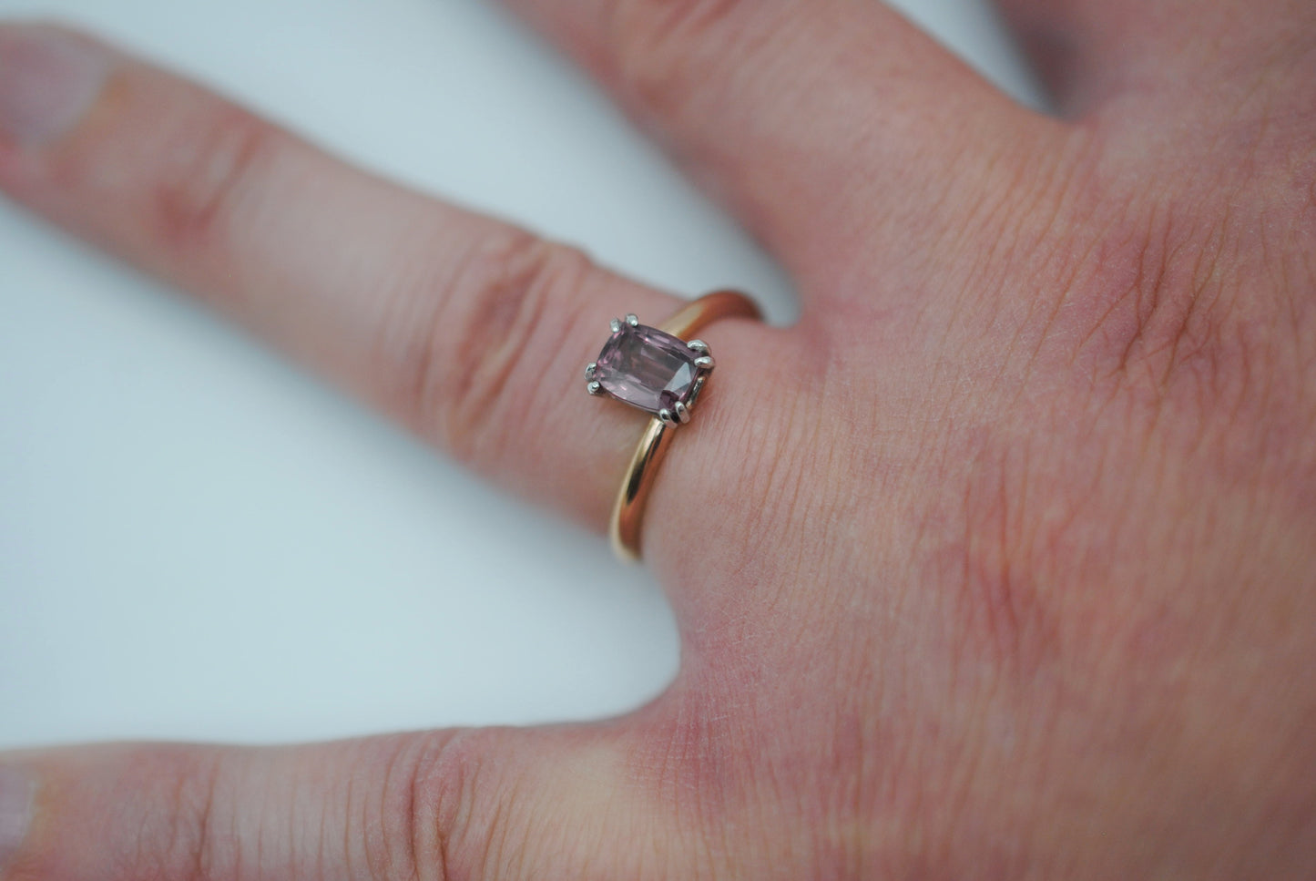 Malaia Garnet Ring: Emerald Cut, Rose Gold Bypass Band, White Gold Setting