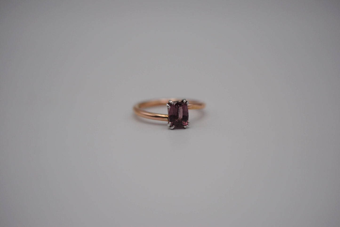 Malaia Garnet Ring: Emerald Cut, Rose Gold Bypass Band, White Gold Setting