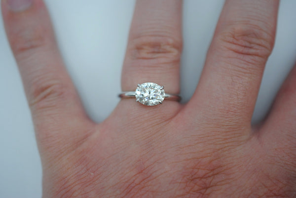 Moissanite Ring: Oval Cut, White Gold, East-West Filligree Prong Setting