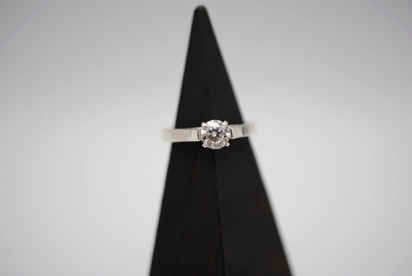 Moissanite Ring: Round Cut, Mokume Game Cathedral Band, White Gold Setting