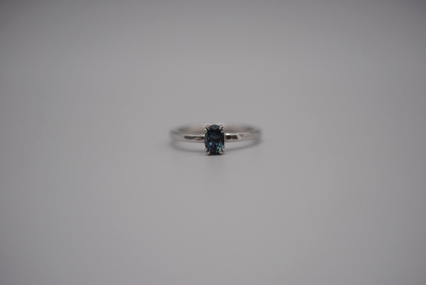 Sapphire Ring: Oval Cut, Hammered Band, Rhodium Finished