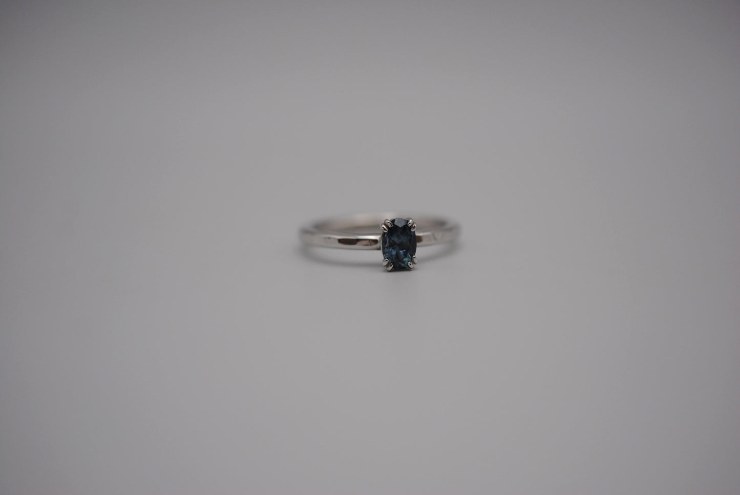 Sapphire Ring: Oval Cut, Hammered Band, Rhodium Finished