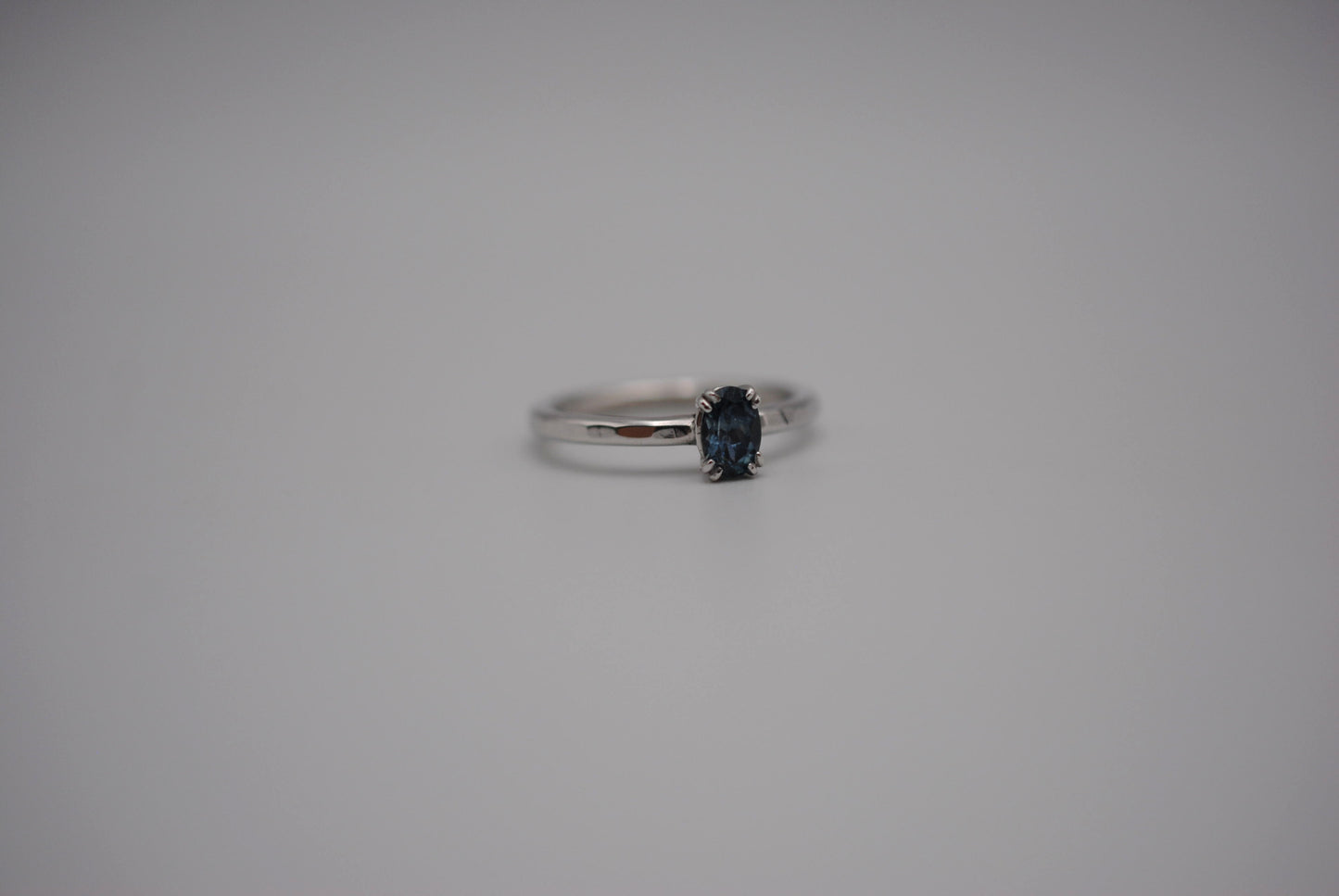 Sapphire Ring: Oval Cut, Hammered Band, Rhodium Finished