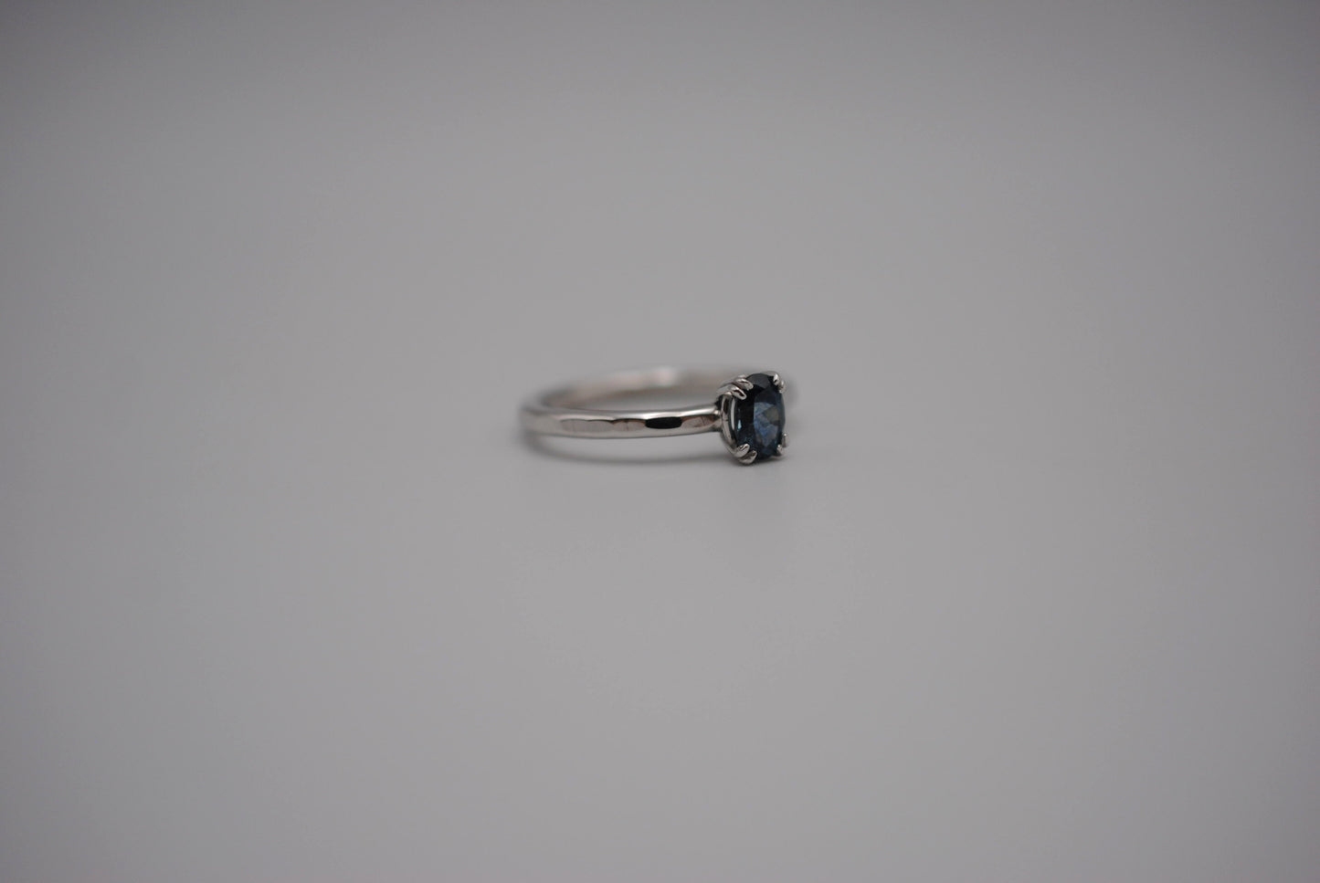 Sapphire Ring: Oval Cut, Hammered Band, Rhodium Finished