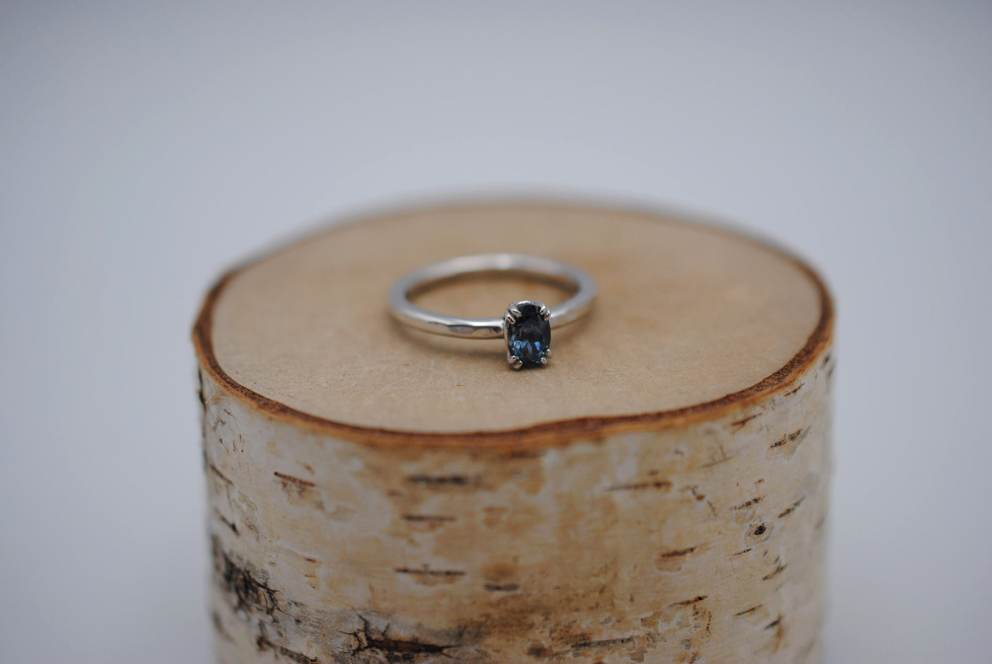 Sapphire Ring: Oval Cut, Hammered Band, Rhodium Finished