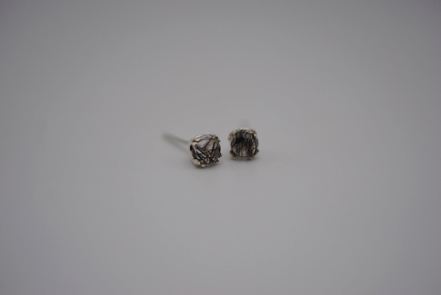 Rutilated Quartz Post Earrings: Round Cut, Silver, Double Prong Setting