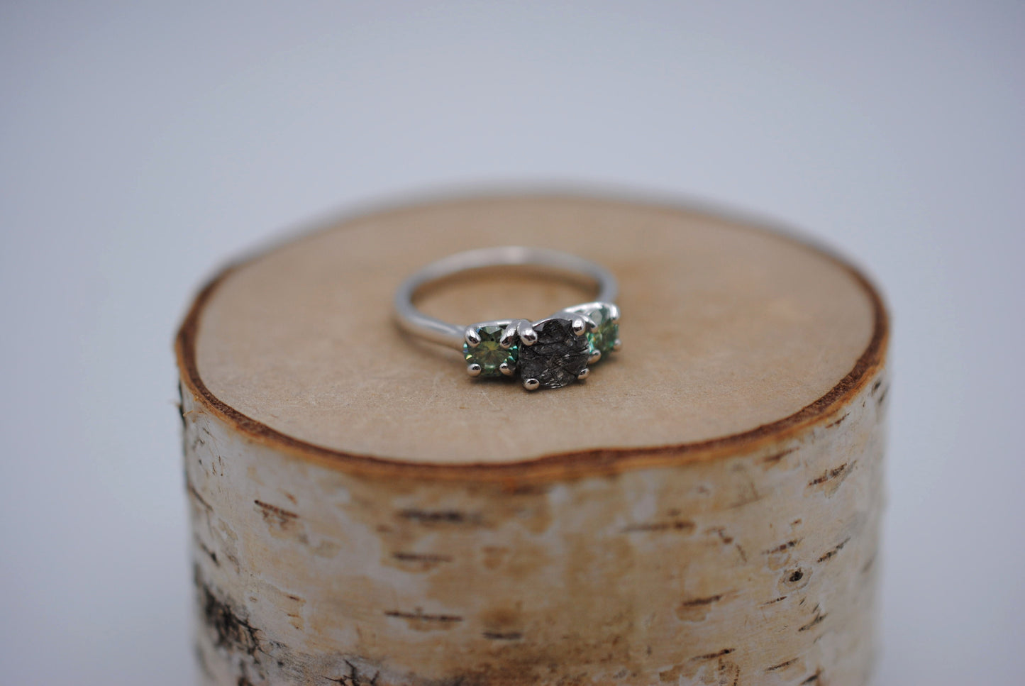 Rutilated Quartz Ring: Round Cut, Teal Moissanite Sidestones, Rhodium Finished