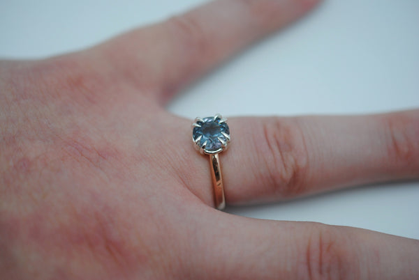Blue Tourmaline Ring: Round Cut, Rose Gold Band, Silver Setting
