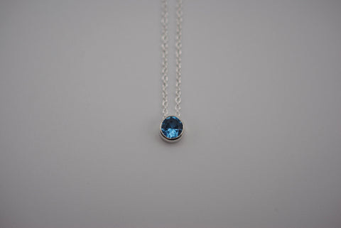 Birthstone Necklace: Round Blue Zircon, Bezel, Silver, Cable Chain