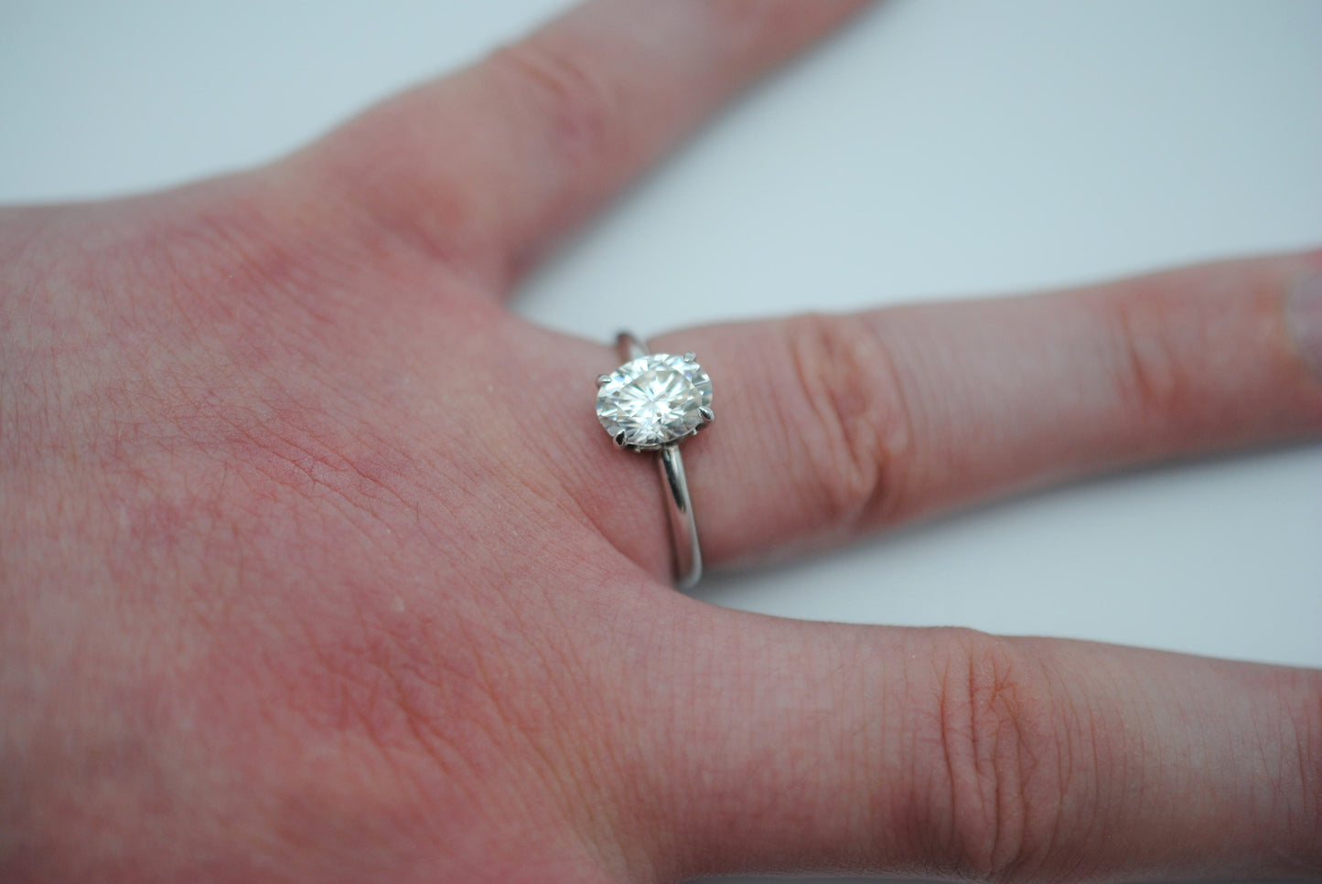 Moissanite Ring: Oval Cut, White Gold, Filligree Prong Setting