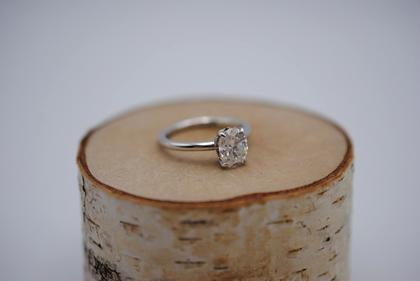 Moissanite Ring: Oval Cut, White Gold, Filligree Prong Setting