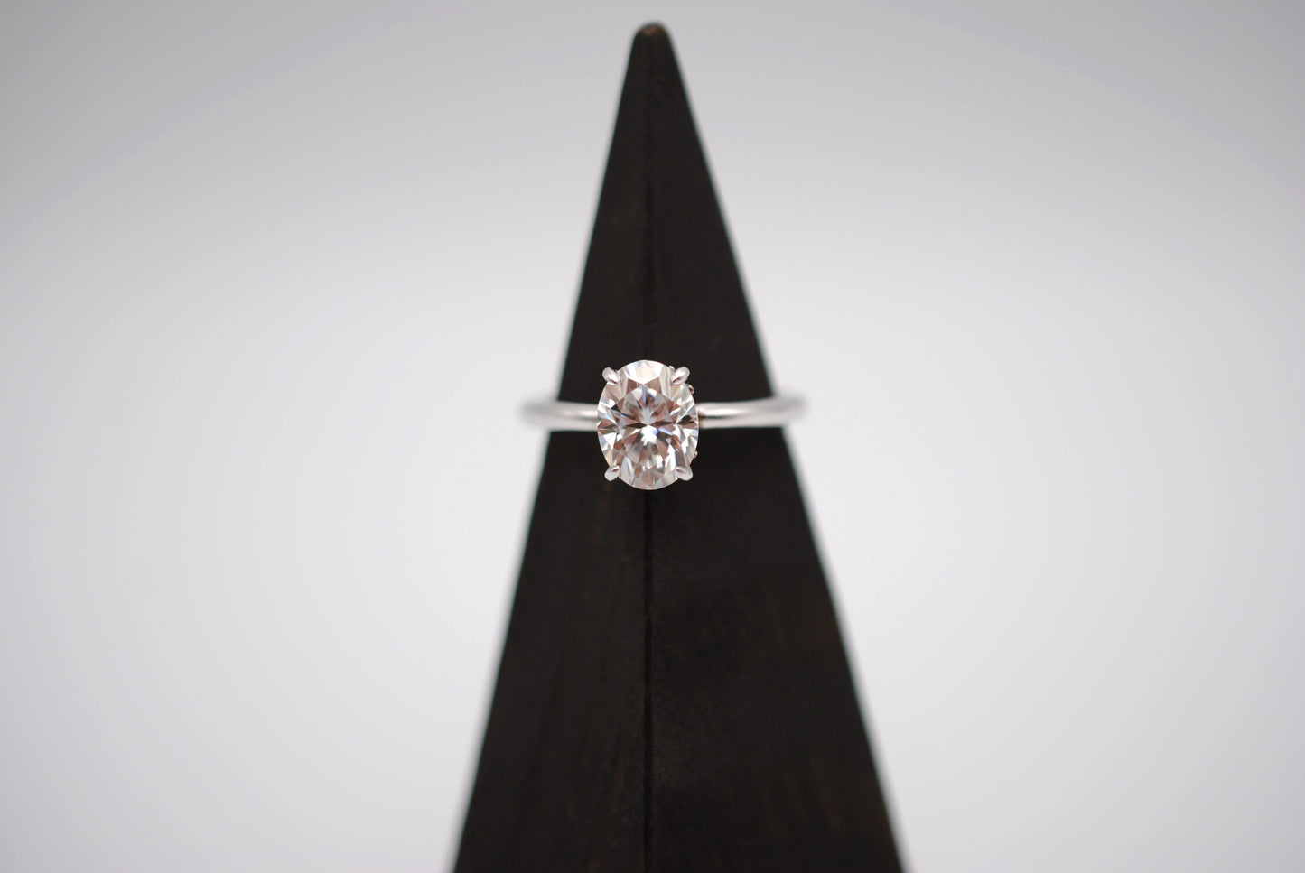 Moissanite Ring: Oval Cut, White Gold, Filligree Prong Setting