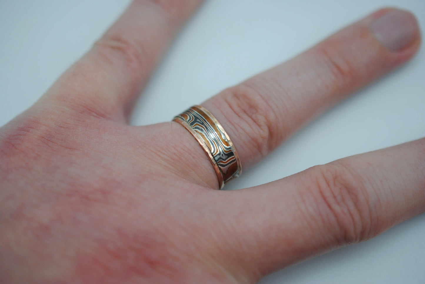Mokume Gane Ring Band: Silver, Copper, Shibuichi, with Hammered Rose Gold Banding