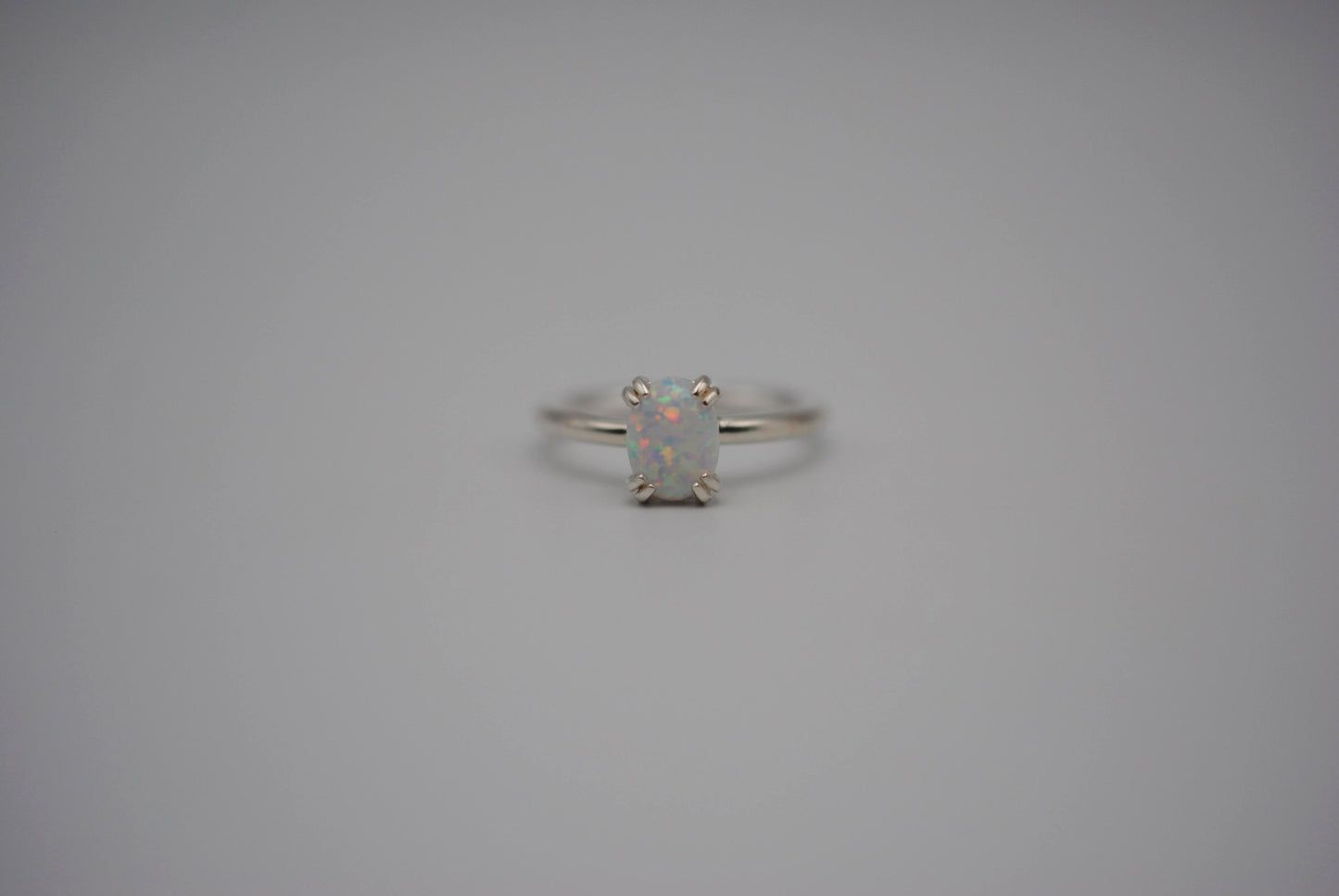 Opal Ring: Oval Cut, Silver, Double Prong Setting