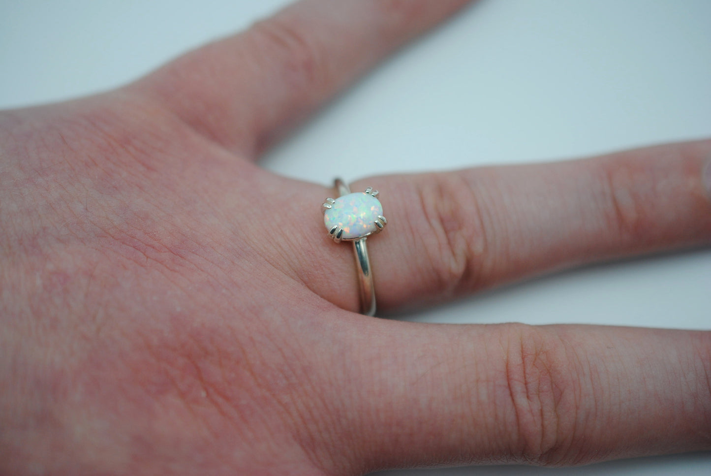 Opal Ring: Oval Cut, Silver, Double Prong Setting