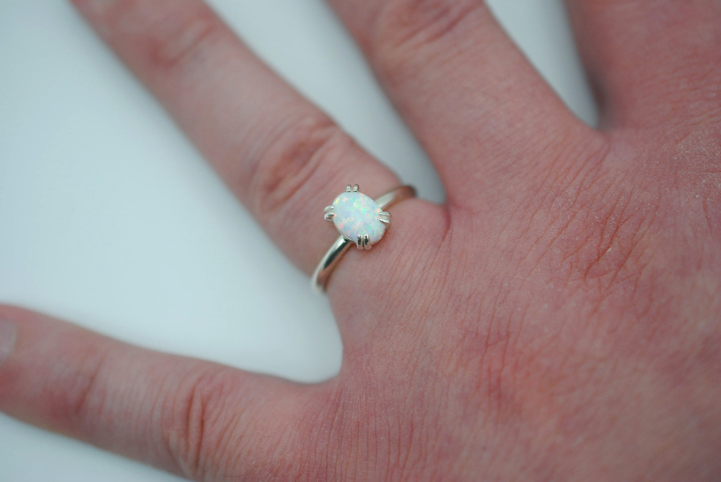 Opal Ring: Oval Cut, Silver, Double Prong Setting