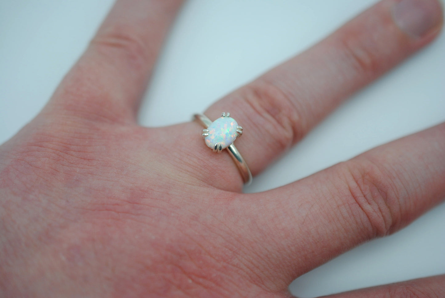 Opal Ring: Oval Cut, Silver, Double Prong Setting