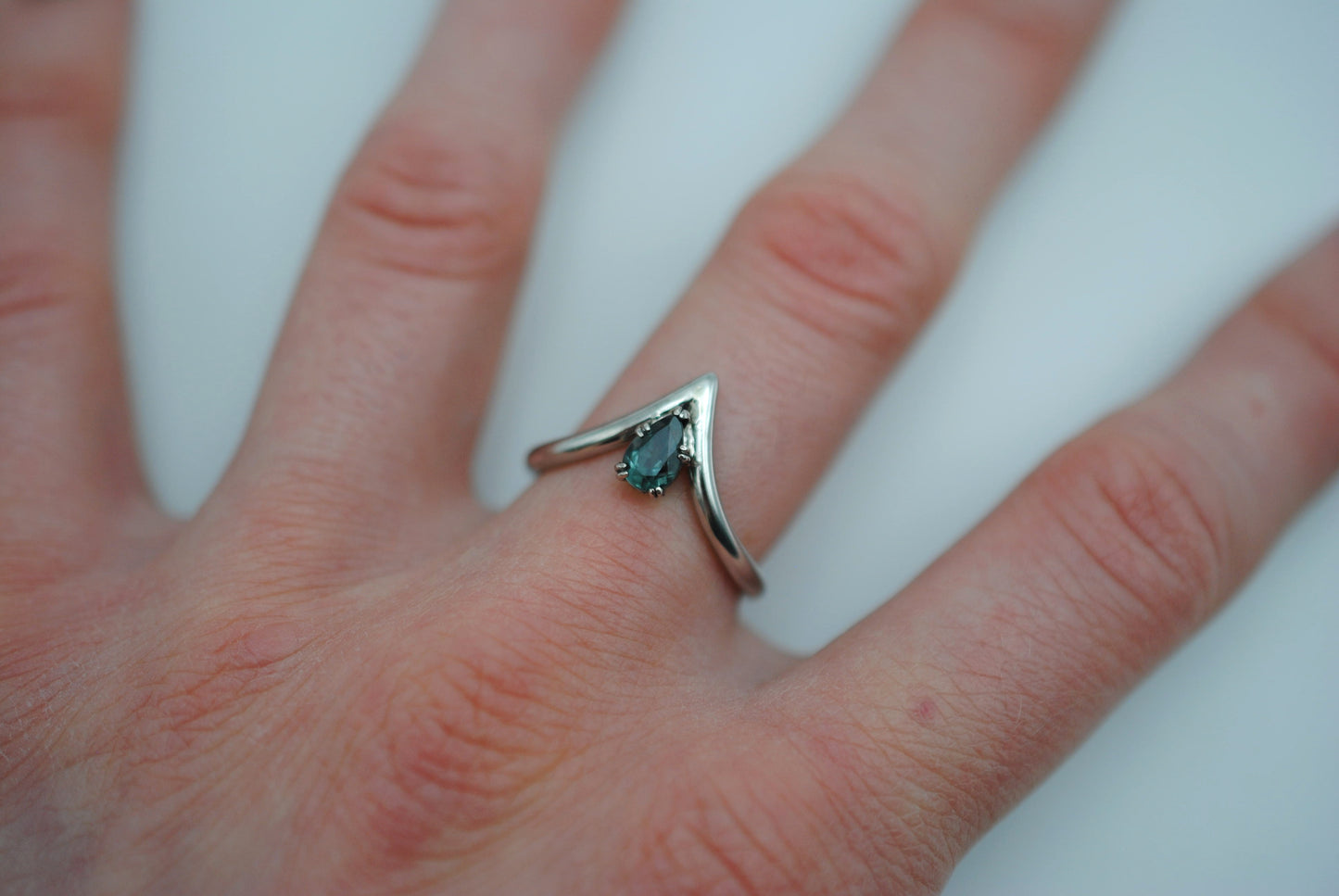 Pear Indicolite Tourmaline on Chevron Rhodium Band with a Solid White Gold Double Prong Setting Ring