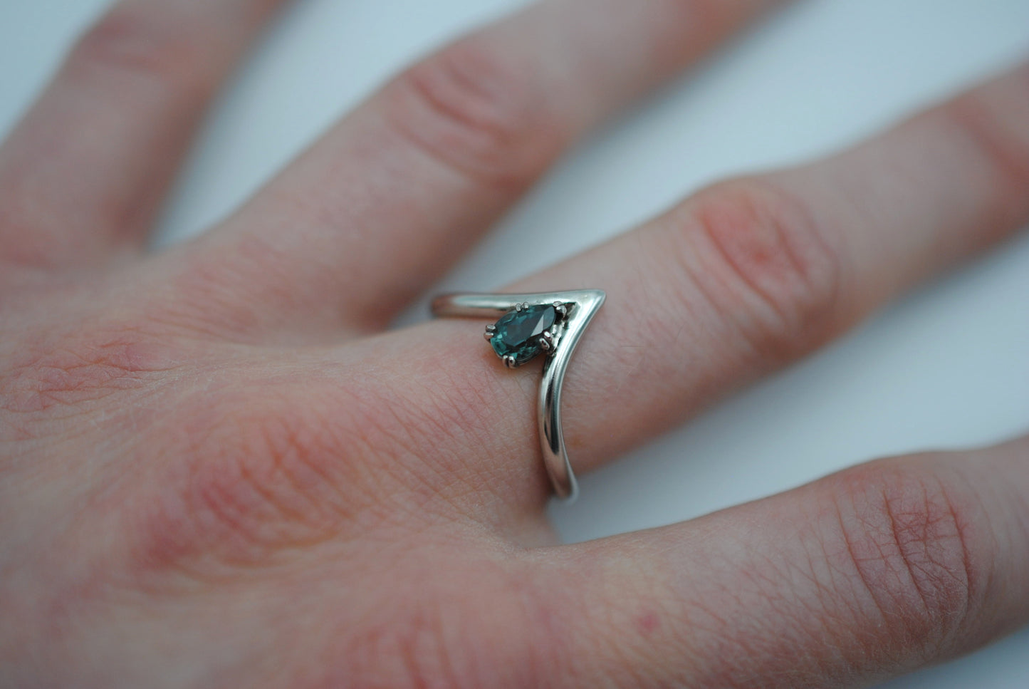 Pear Indicolite Tourmaline on Chevron Rhodium Band with a Solid White Gold Double Prong Setting Ring