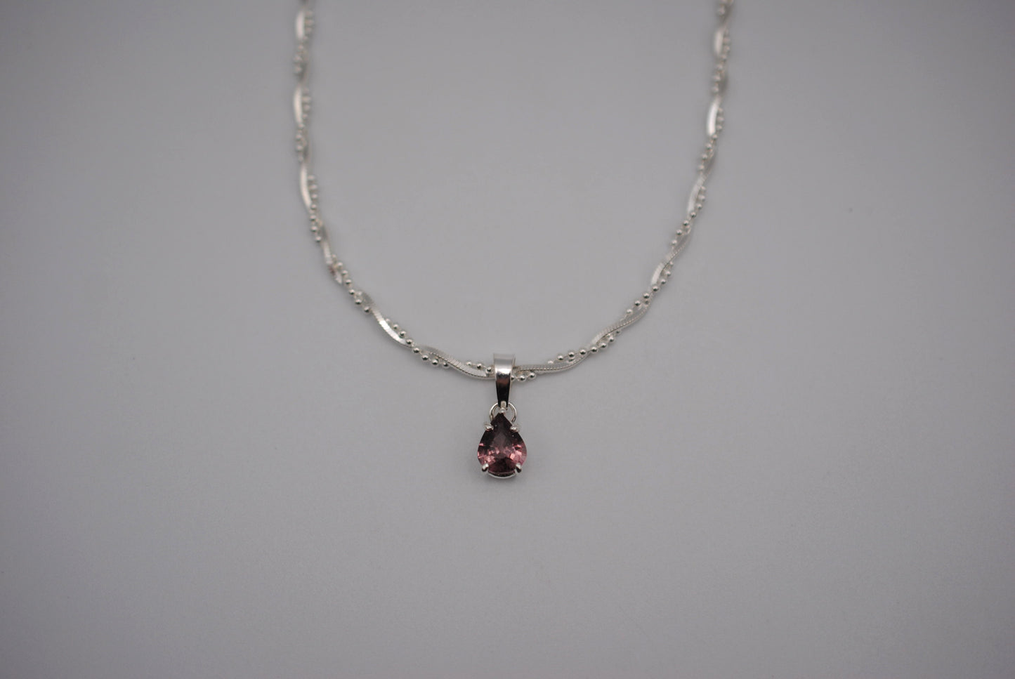 Malaia Garnet Necklace: Pear Cut, Silver Setting, Twisted Ball Snake and Box Chain