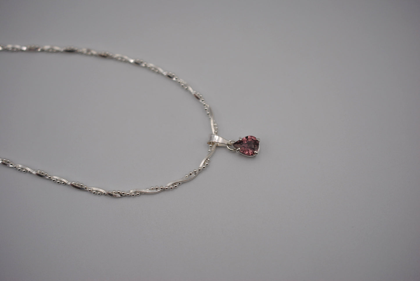 Malaia Garnet Necklace: Pear Cut, Silver Setting, Twisted Ball Snake and Box Chain