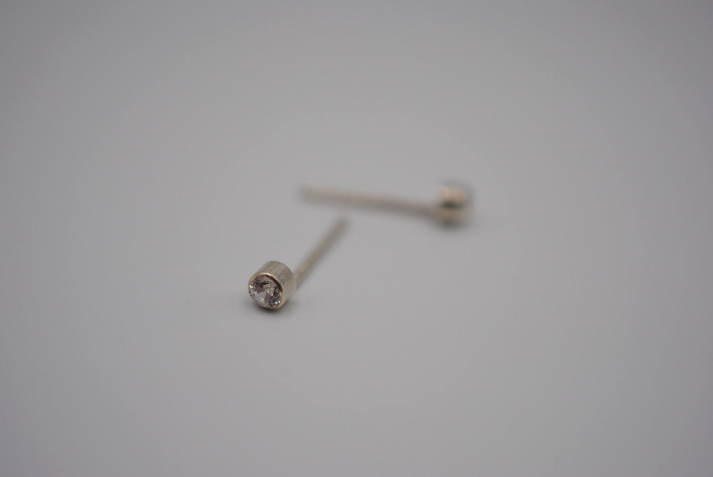 Dainty Post Earrings with Cubic Zirconia in Bezel Setting