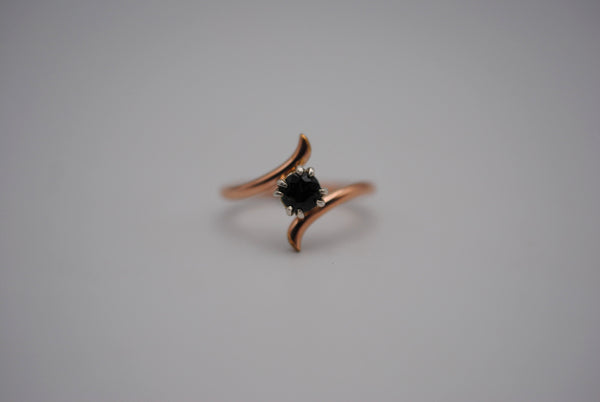 Round Nigerian Sapphire on Rose Gold Bypass Band in Silver Setting Ring