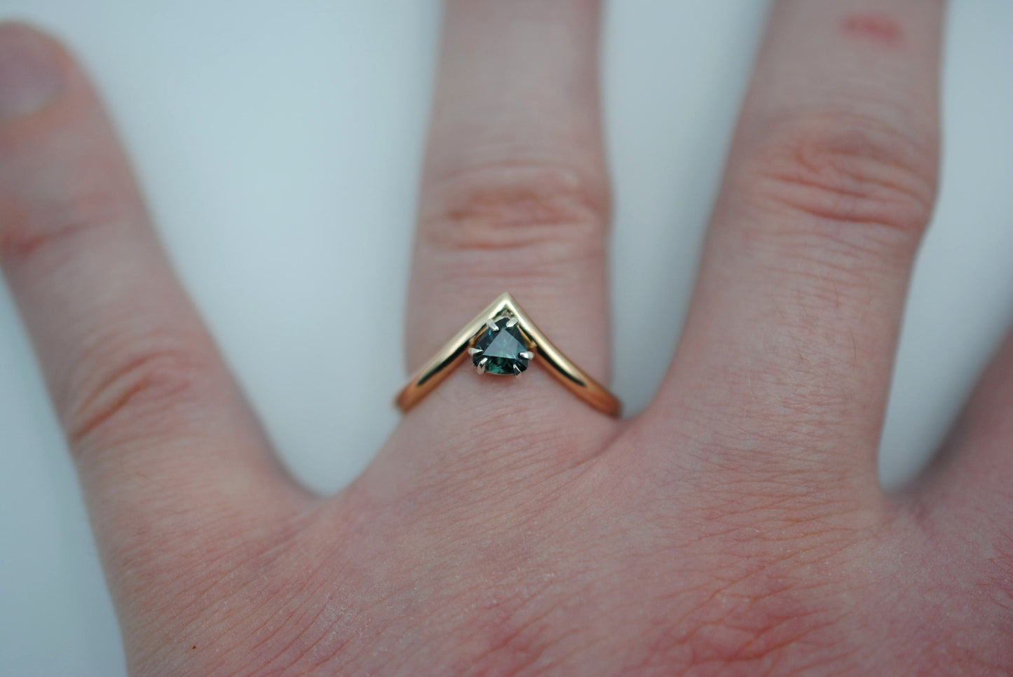 Nigerian Sapphire Ring: Trillion Cut, Yellow Gold Chevron Band, Silver Setting